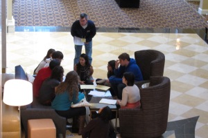 Students Gathering in the Hotel Lobby as they  Prepare for Monday.